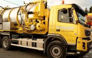 Camion de vidange jaune